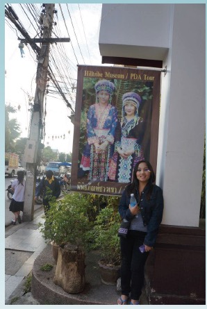 Photo: Boa in Thailand on street in front of a sign
