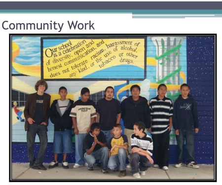 Photo of Diego and other students posing in front of mural by Diego “Our School…” Potter Jr. High School, Fallbrook, CA. 2006 with words Community Work Our school is a celebration of diversity, open and honest communication, and does not tolerate racism harassment of any kind or the use of alcohol tobacco or other drugs