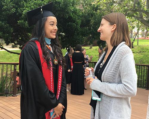 Dr. Sarah Reith connects with one of her graduates