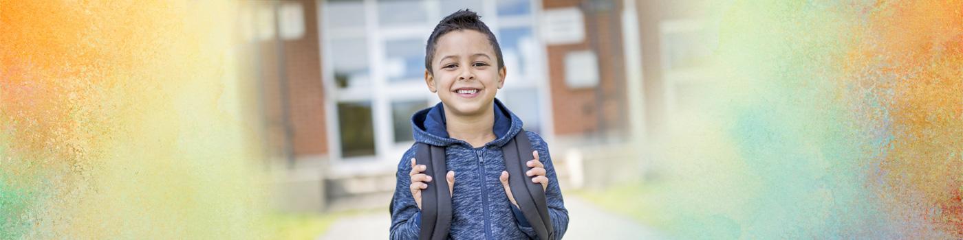 male student with backpack